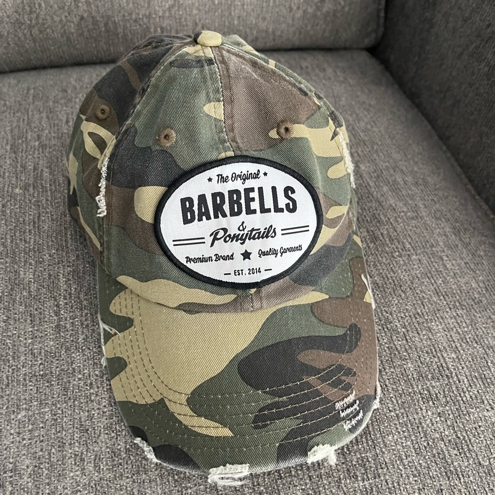Woman’s camouflage adjustable camouflage hat.